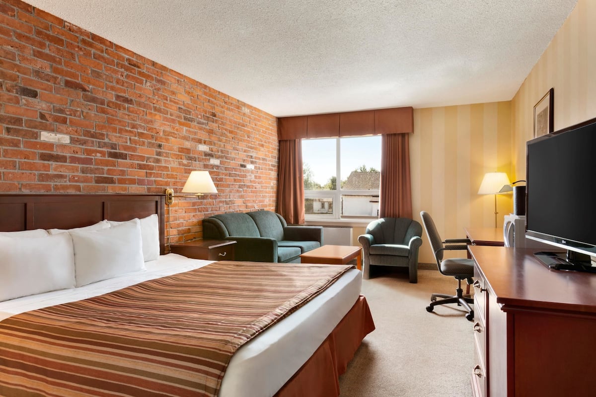 Premium bedding, pillow-top beds, blackout curtains, iron/ironing board