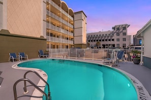 Seasonal outdoor pool, open 10:00 AM to 10:00 PM, sun loungers