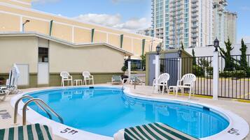 Seasonal outdoor pool, open 10:00 AM to 10:00 PM, sun loungers