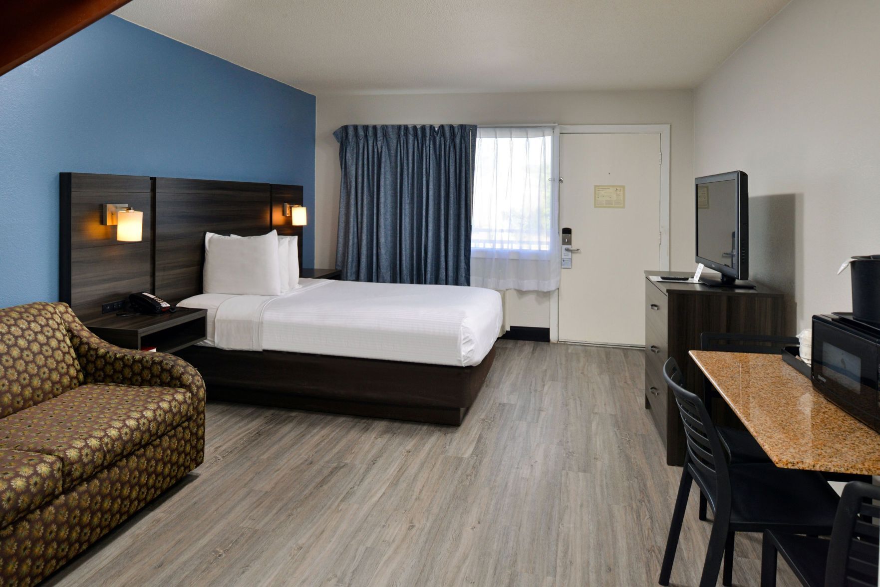 In-room safe, laptop workspace, blackout curtains, iron/ironing board