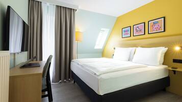 Hypo-allergenic bedding, in-room safe, desk, blackout drapes