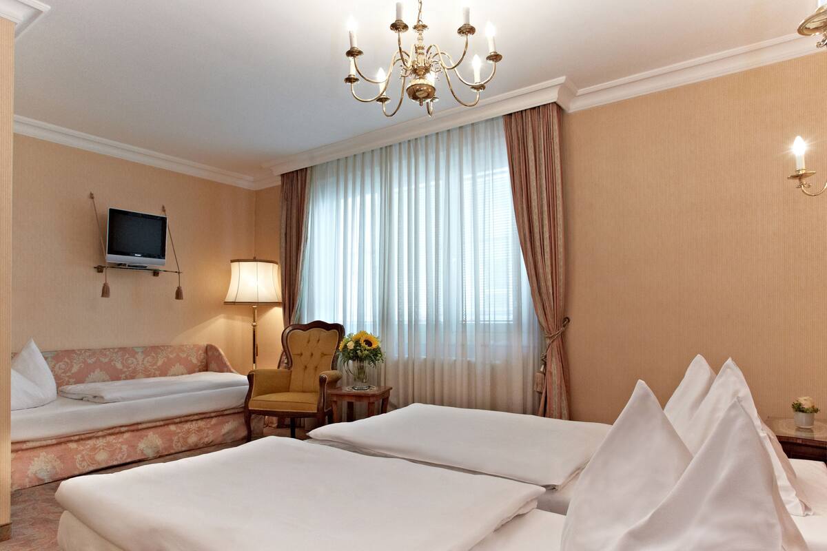 Hypo-allergenic bedding available, down comforters, minibar