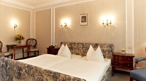 Hypo-allergenic bedding, down duvets, minibar, in-room safe