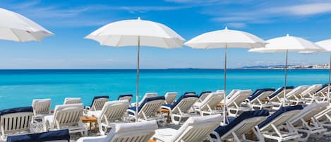 Una spiaggia nelle vicinanze, teli da spiaggia