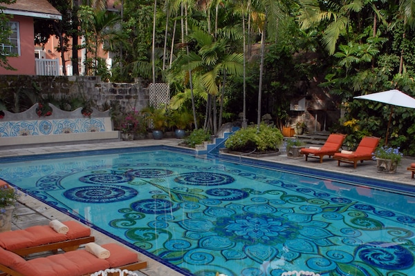 2 outdoor pools, pool umbrellas, pool loungers