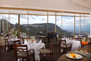 Breakfast, lunch, dinner served; local cuisine, pool views