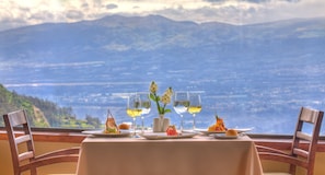 Breakfast, lunch, dinner served; local cuisine, pool views