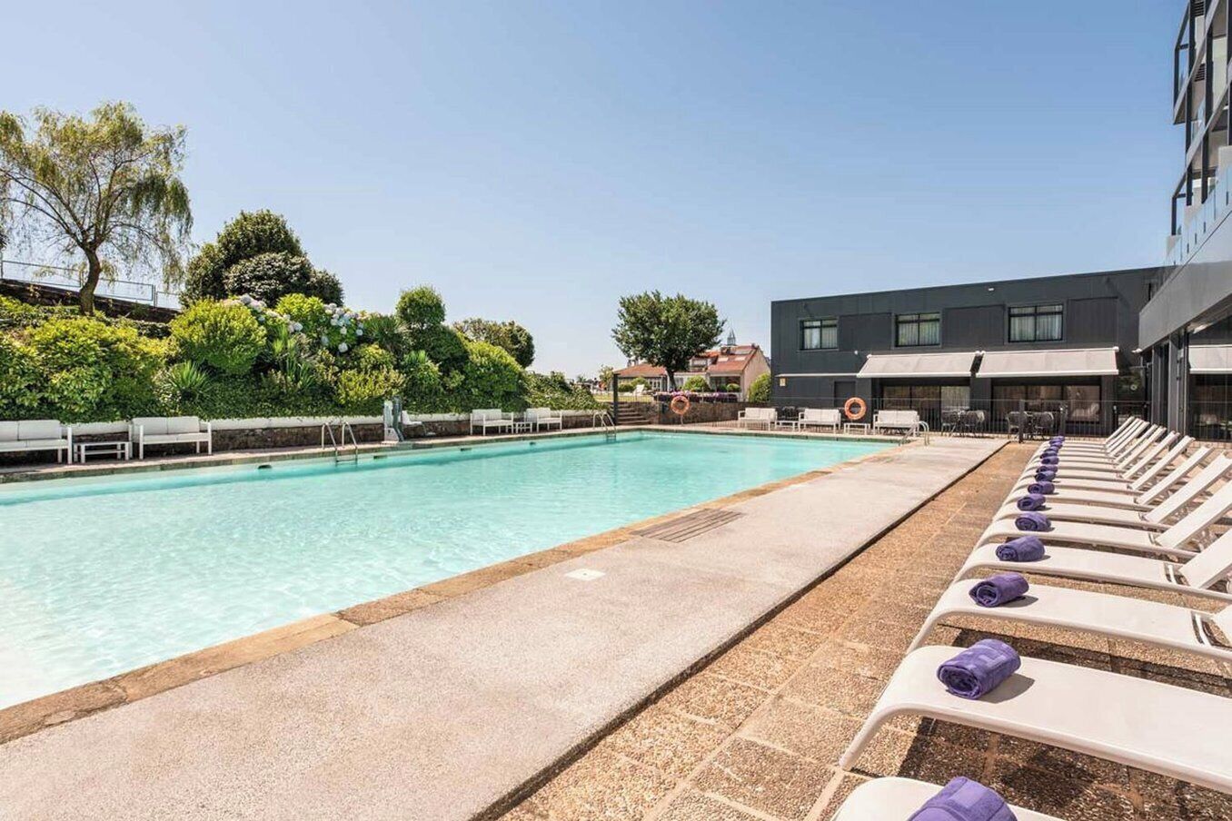 seasonal outdoor pool, open 4:00 pm to 9:00 pm, pool umbrellas