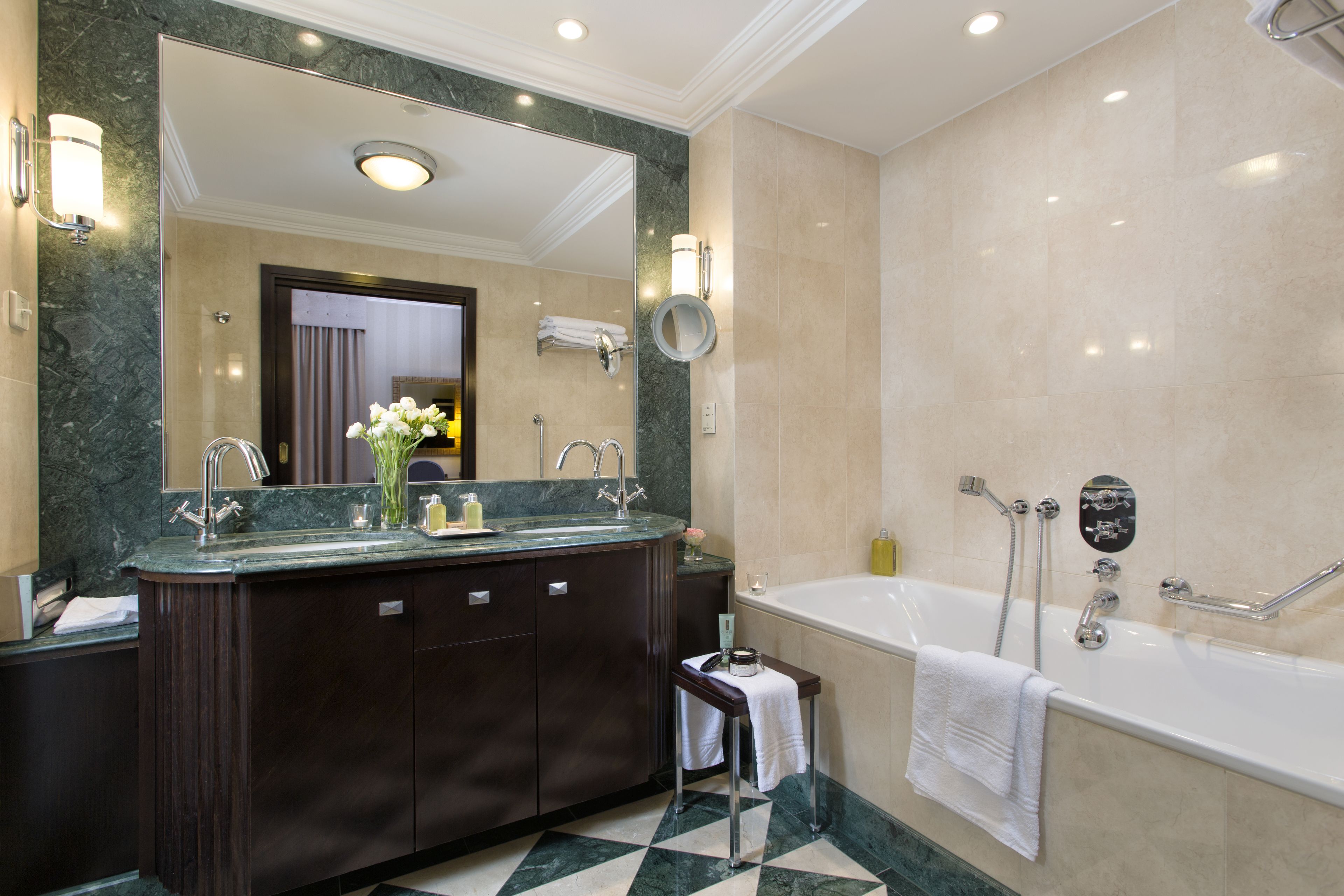 combined shower/bathtub, rainfall showerhead, designer toiletries