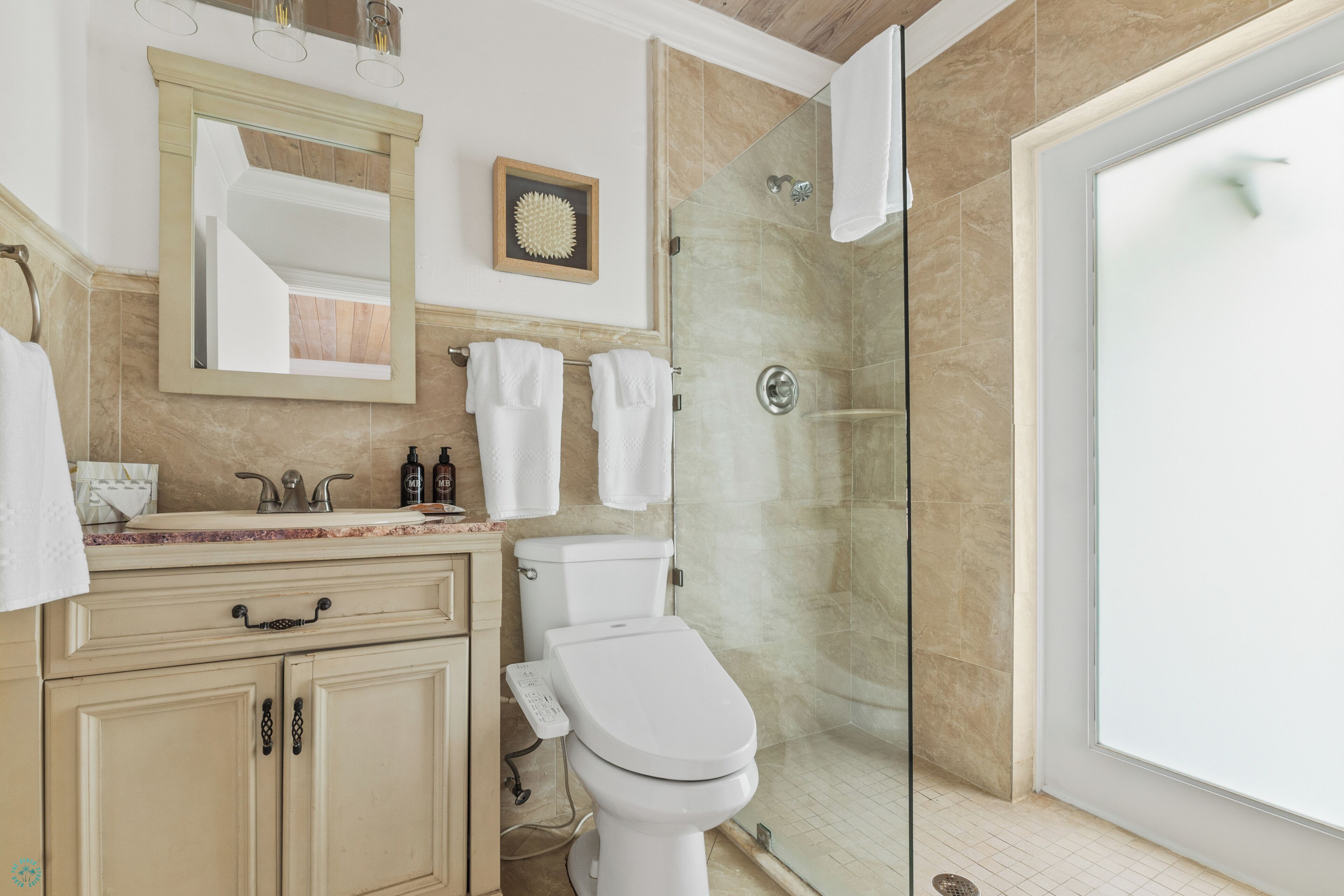 king room with daybed | bathroom | designer toiletries, hair dryer, towels