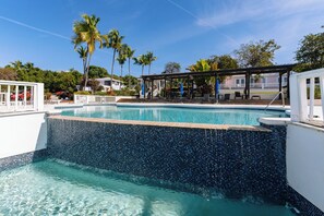 Outdoor pool, free cabanas, pool umbrellas