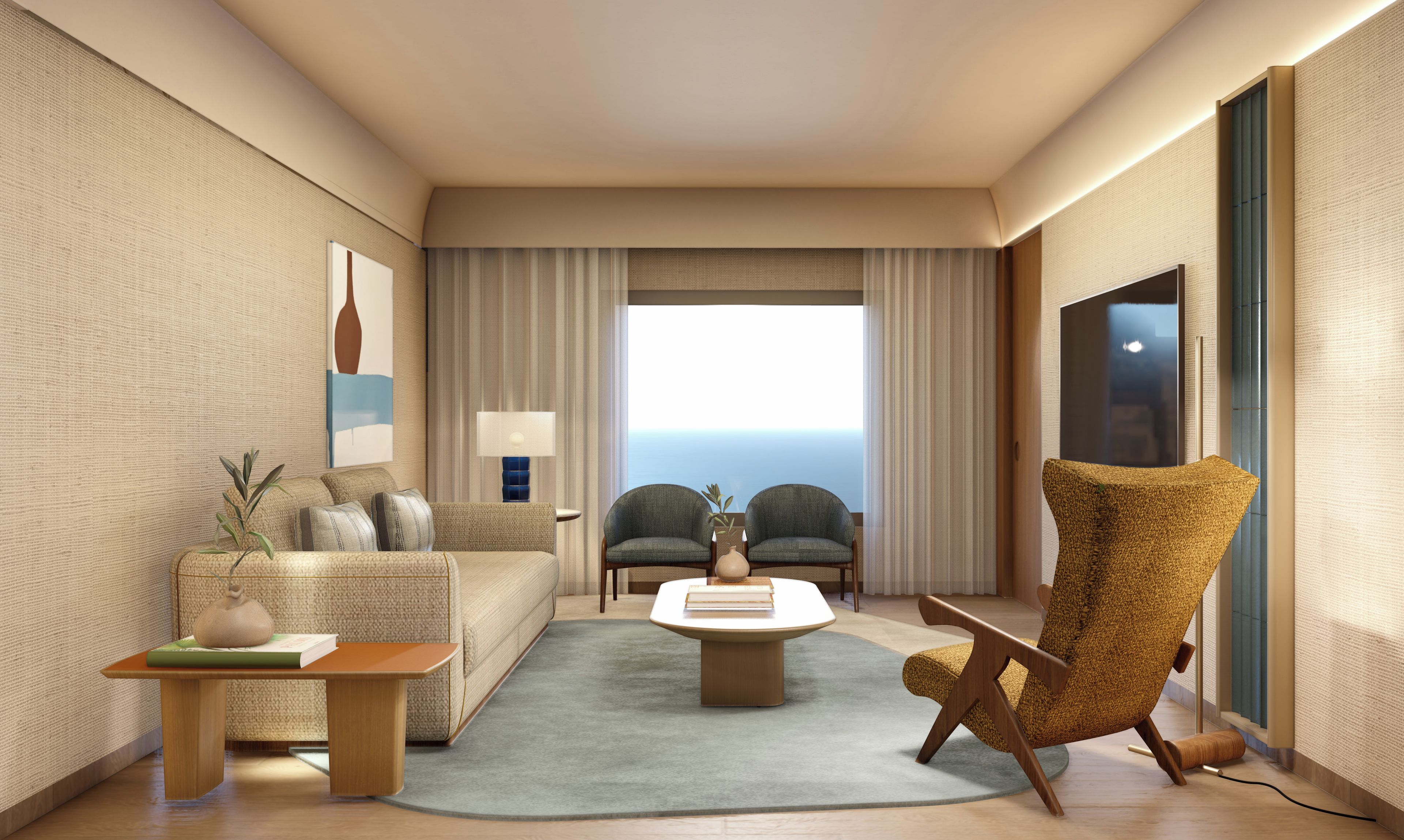 Habitación de hotel moderna con sofá, sillones, una mesita de centro y vista al océano.