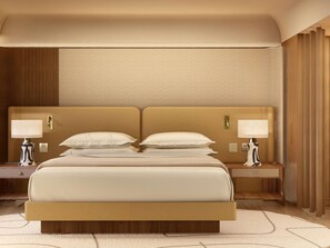 A hotel room with a large bed, two bedside tables, and a headboard with a textured wall behind it.