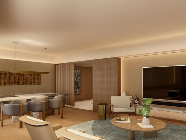 A modern living room with a dining area, a large flat-screen TV, and a minimalist decor.