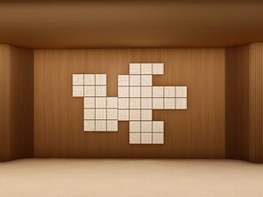 A room with wooden panel walls and a geometric floor plan design.