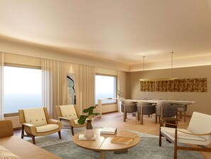 Una habitación de hotel moderna con comedor, ventanas amplias y vistas.