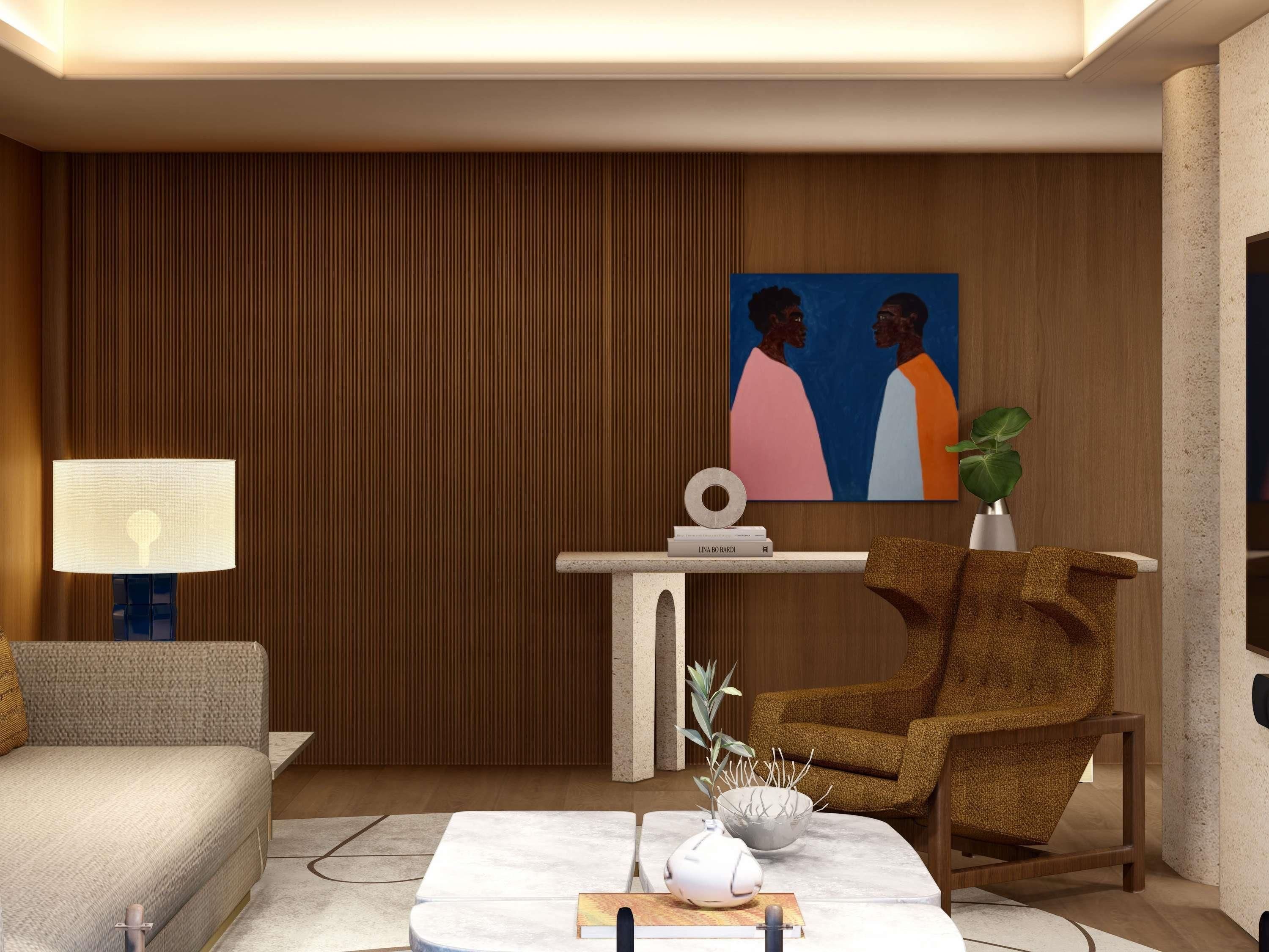 Una sala de estar moderna con un sofá, una mesa de centro con adornos, una lámpara, un sillón, una mesita con una planta y un cuadro en la pared.