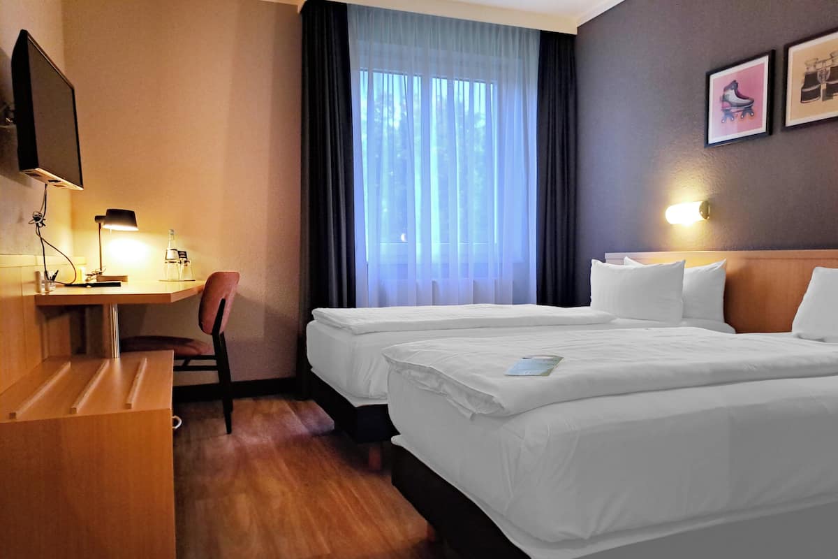 Hypo-allergenic bedding, desk, blackout curtains, soundproofing
