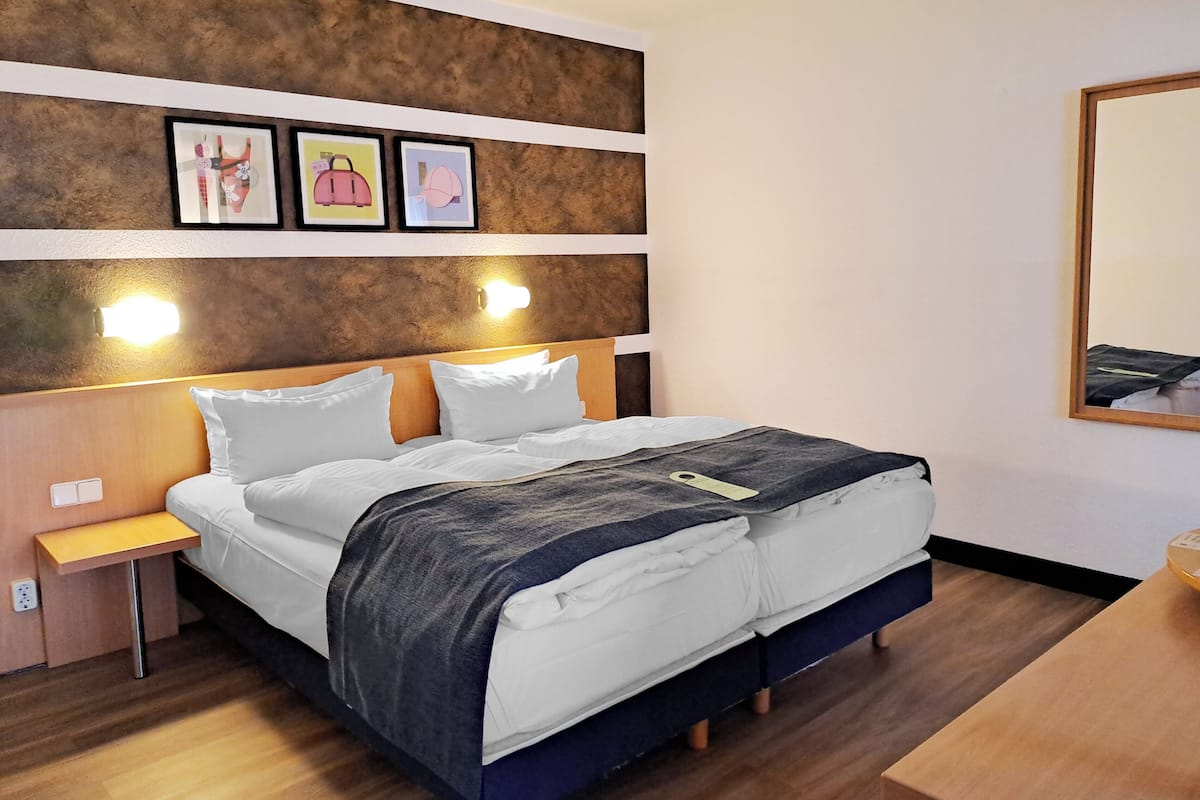 Premium Room, Multiple Beds (Up to 3 Adults) | Hypo-allergenic bedding, desk, blackout drapes, soundproofing