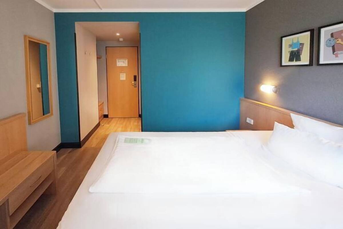Hypo-allergenic bedding, desk, blackout drapes, soundproofing