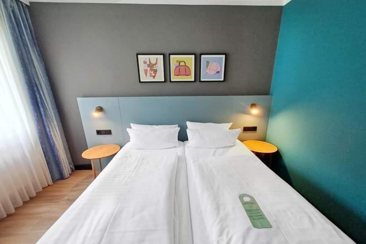 Hypo-allergenic bedding, desk, blackout drapes, soundproofing