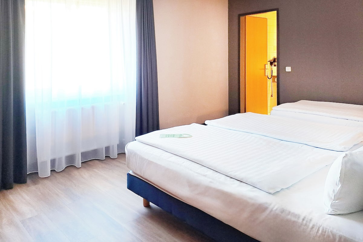 Hypo-allergenic bedding, desk, blackout drapes, soundproofing