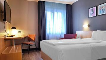 Hypo-allergenic bedding, desk, blackout curtains, soundproofing