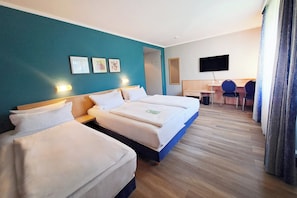 Hypo-allergenic bedding, desk, blackout drapes, soundproofing