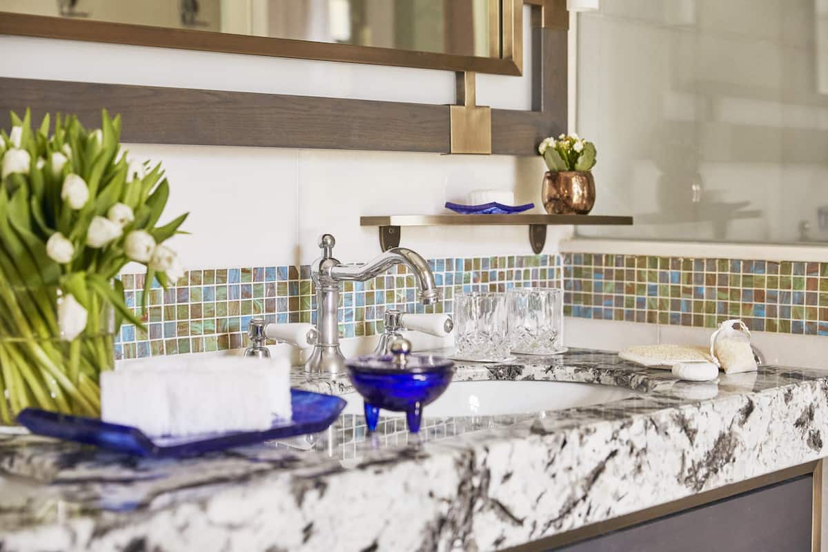 separate bathtub and shower, designer toiletries, hair dryer, bathrobes