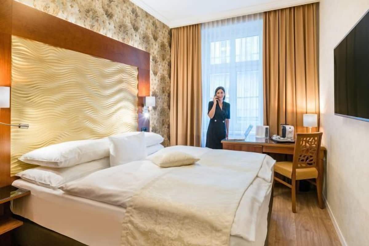 Premium bedding, pillowtop beds, in-room safe, individually decorated