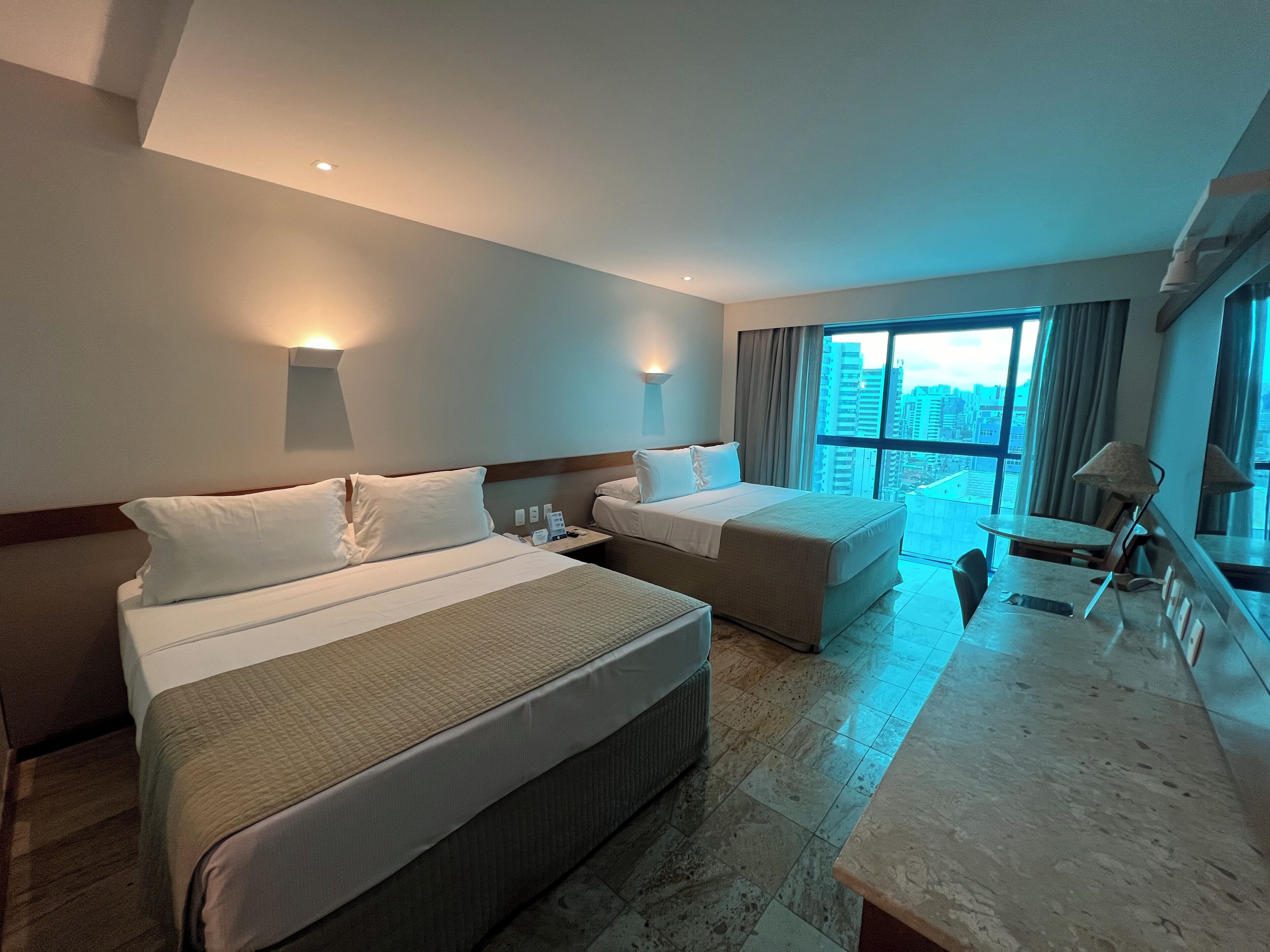 family room | 1 bedroom, minibar, in-room safe, desk