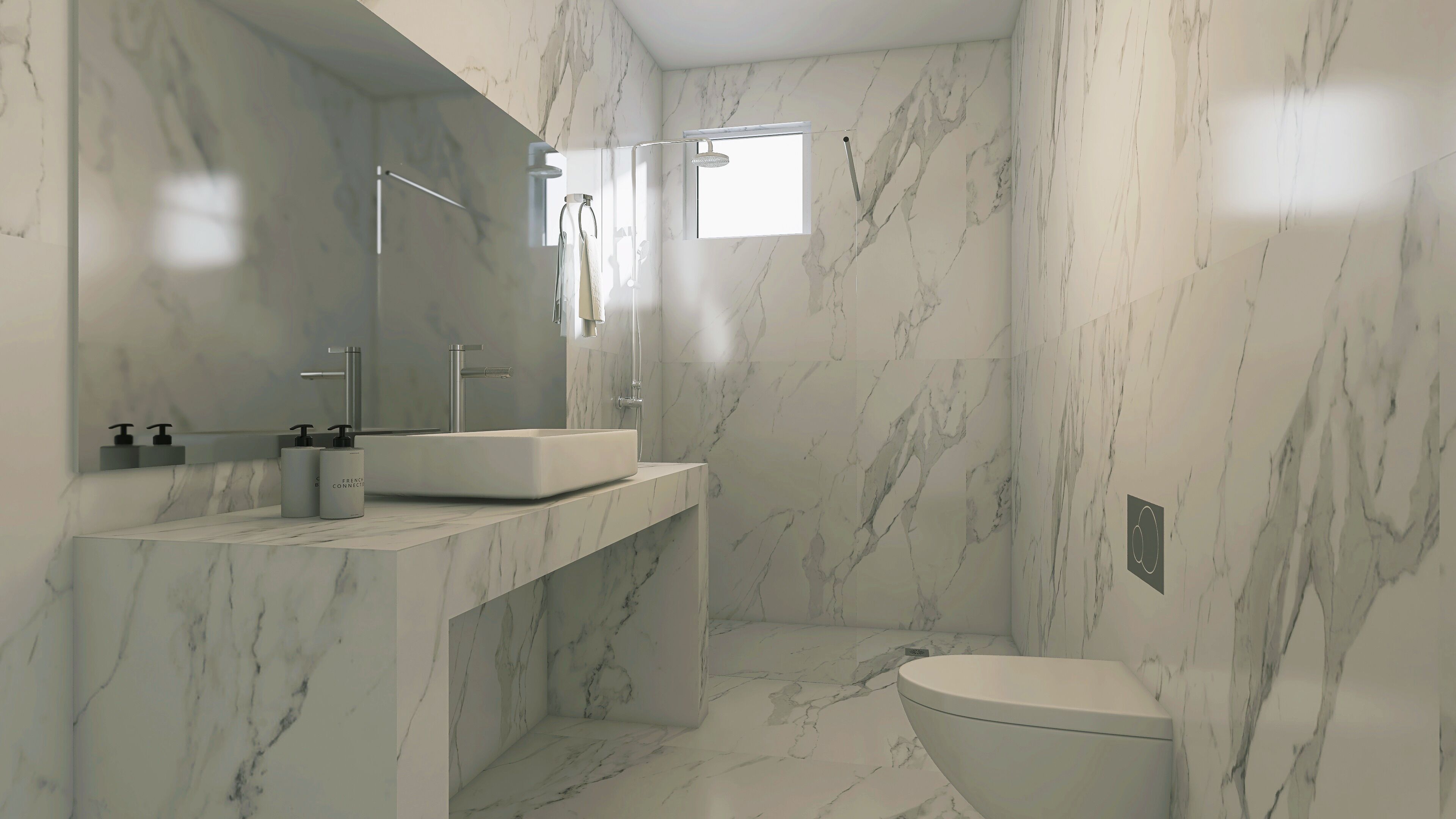 Un baño moderno con lavamanos de mármol, inodoro y ducha.