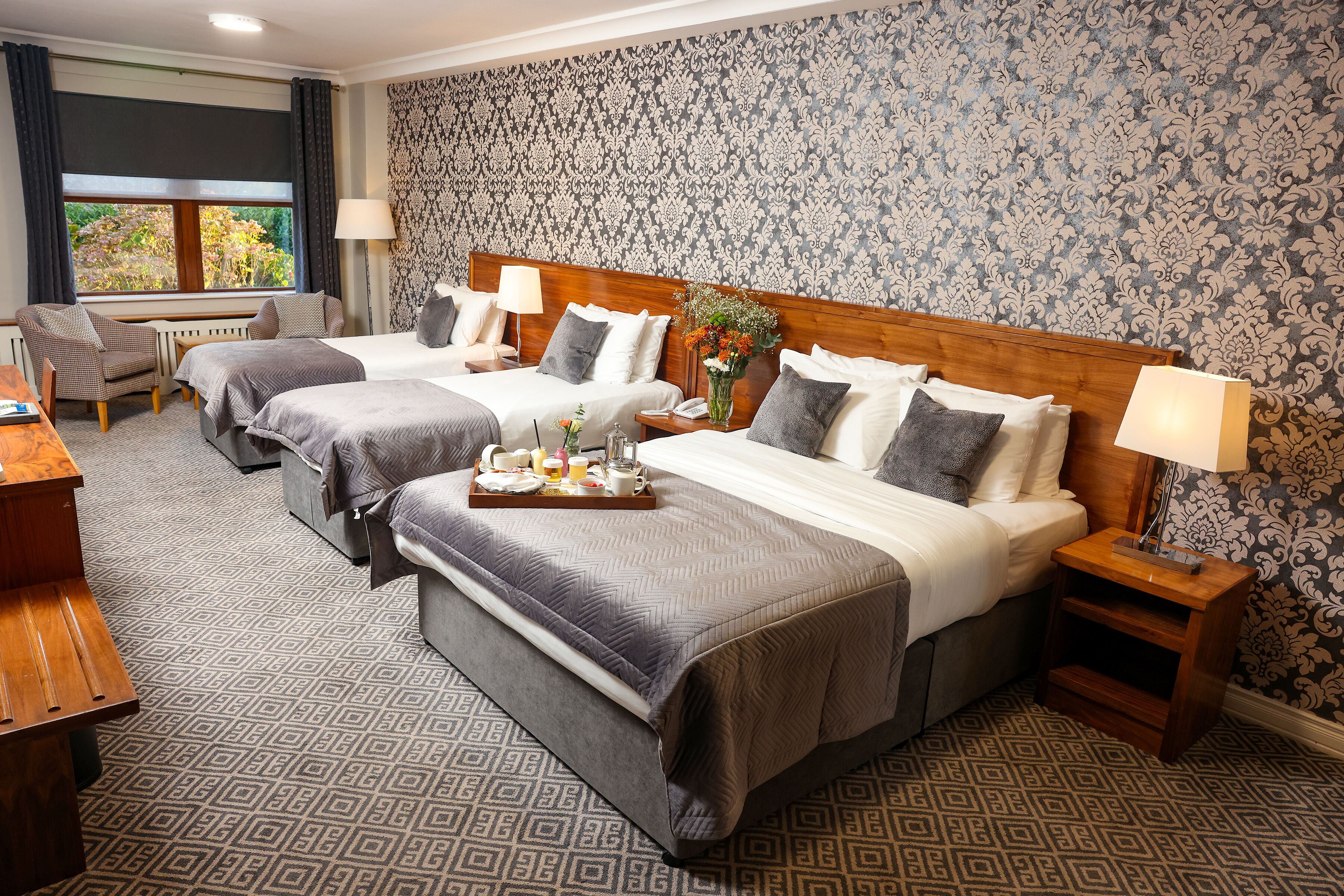 family room | 1 bedroom, premium bedding, in-room safe, desk