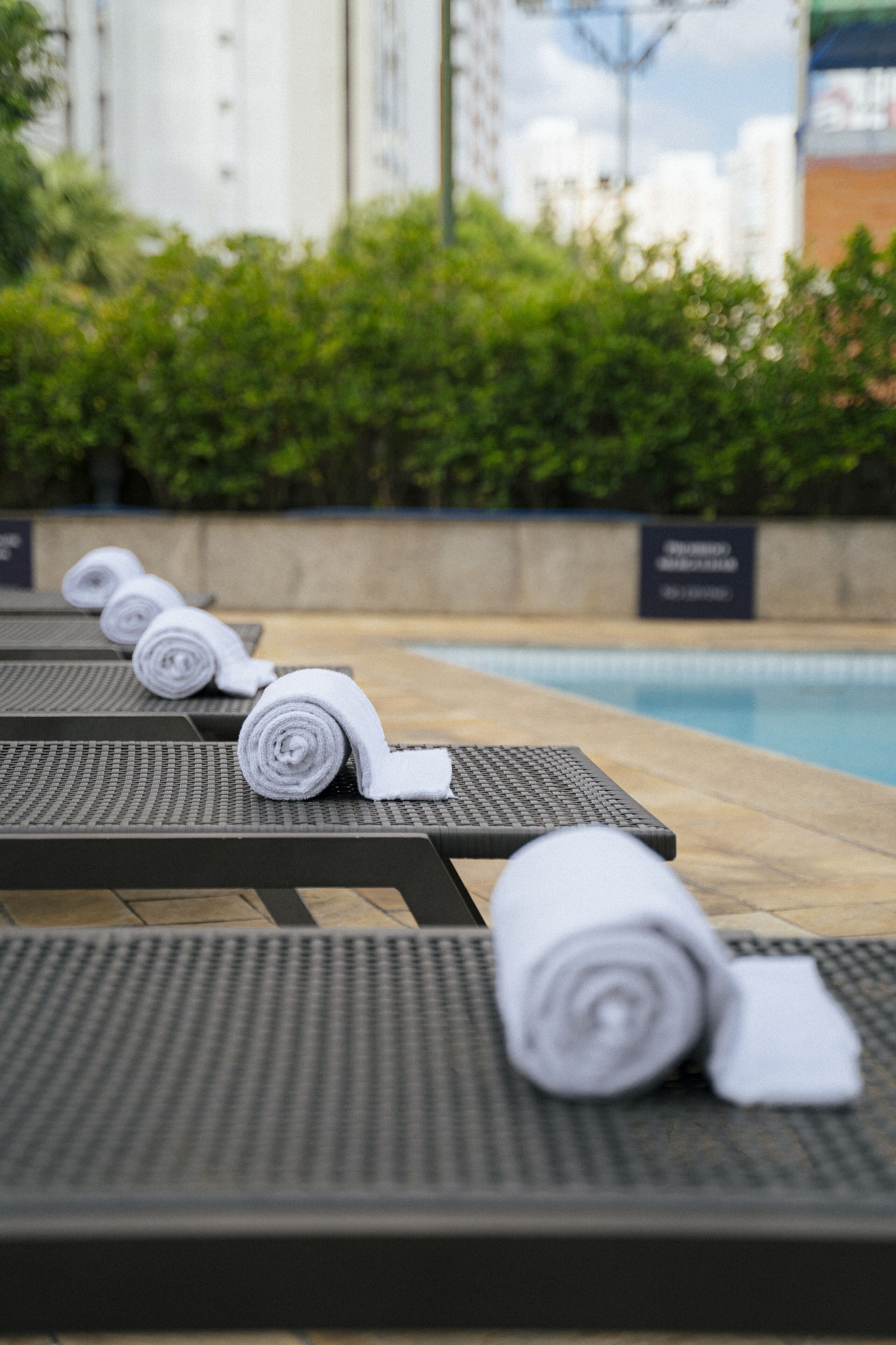 outdoor pool, pool umbrellas, pool loungers