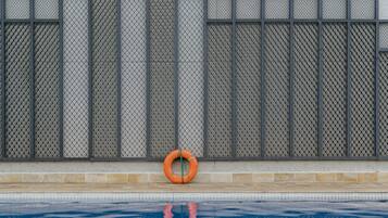 Outdoor pool, pool umbrellas, pool loungers