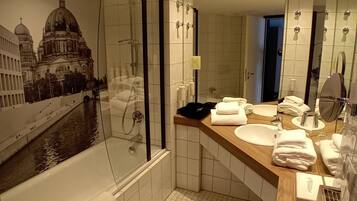 Eco-friendly toiletries, hair dryer, towels