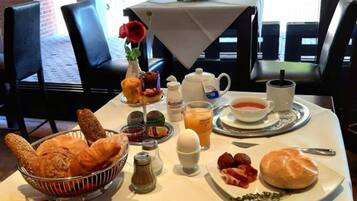 Daily buffet breakfast (EUR 18 per person)