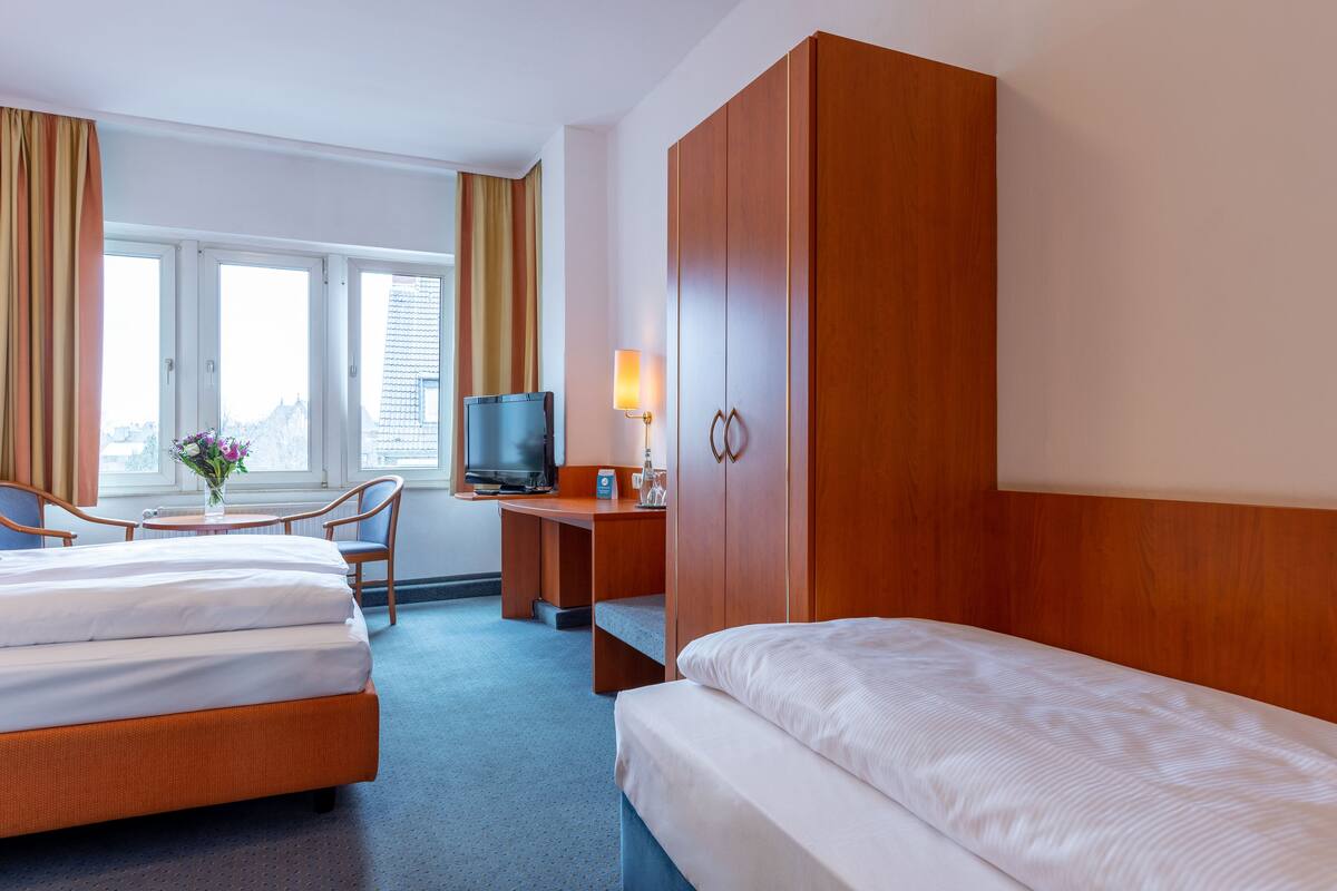 Desk, WiFi (free), bed sheets
