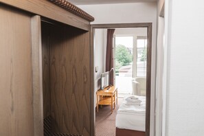 Hypo-allergenic bedding, desk, blackout drapes, soundproofing
