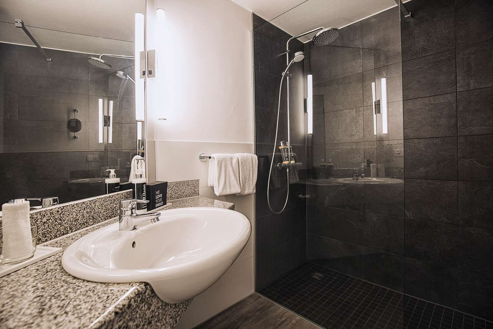 combined shower/bathtub, free toiletries, hair dryer, bathrobes