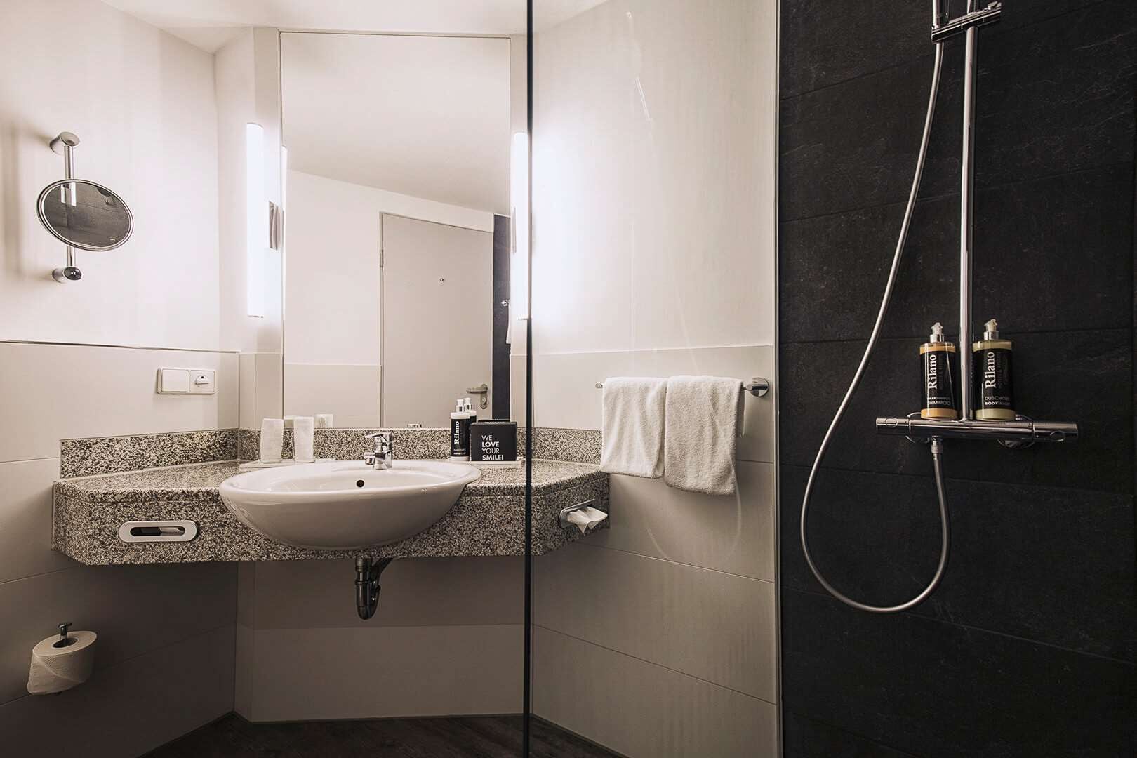 combined shower/bathtub, free toiletries, hair dryer, bathrobes