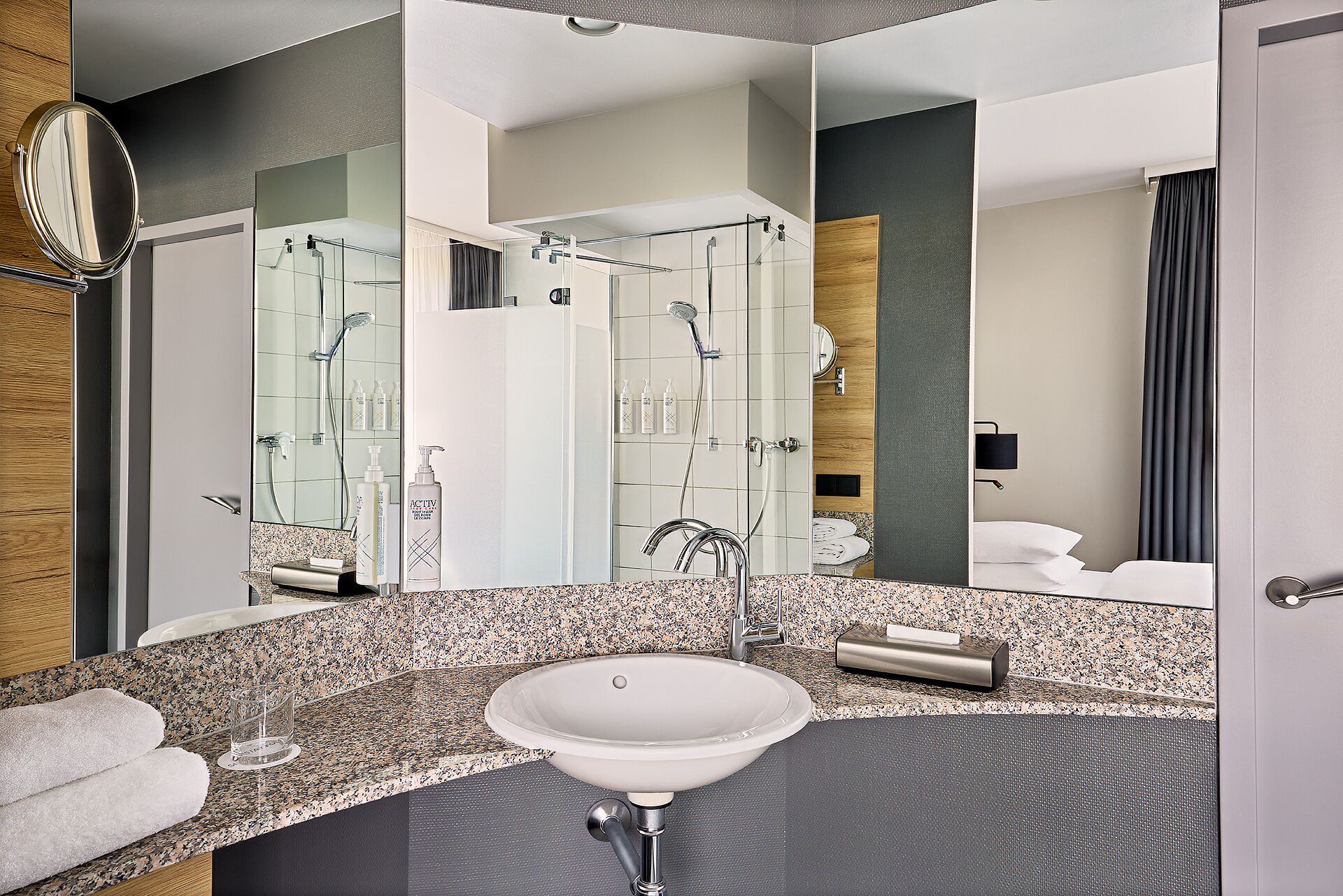 eco-friendly toiletries, hair dryer, towels