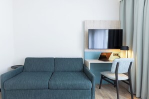 Habitación Confort | Caja de seguridad en la habitación, escritorio y cortinas blackout 