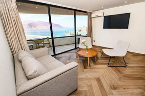 Superior Apartment, 2 Bedrooms | Living area | 32-inch LCD TV with cable channels, TV - Studio 56 Apart Hotel by Terrado Iquique (Iquique)