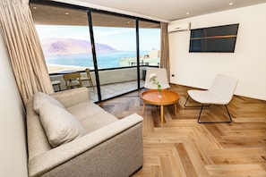 Superior Apartment, 2 Bedrooms | Living area | 32-inch LCD TV with cable channels, TV
