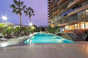 Outdoor pool, pool umbrellas, pool loungers