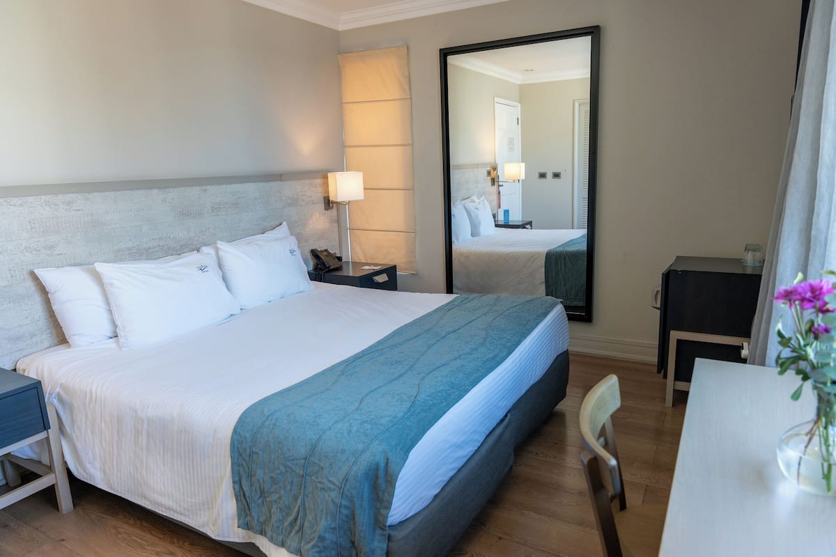 Chambre exécutive double, 1 trÚs grand lit, vue sur la ville | Literie de qualité, minibar, coffre-fort, ameublement unique