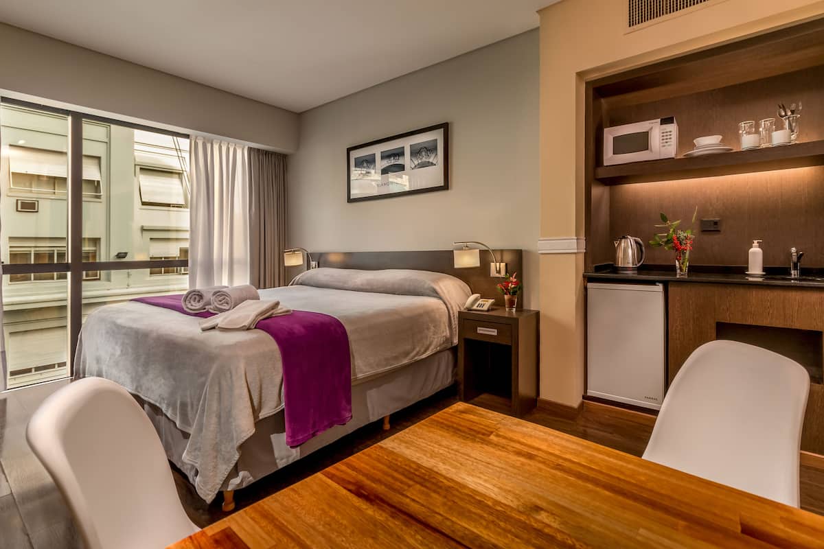 Standard Triple Room | Minibar, in-room safe, blackout drapes, iron/ironing board