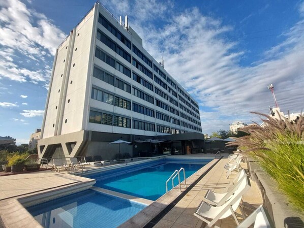 Outdoor pool, open 11:00 AM to 7:00 PM, sun loungers