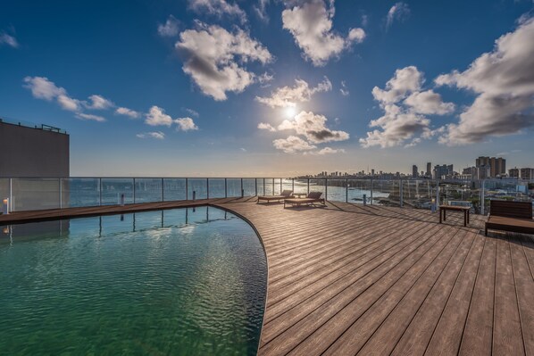 Outdoor pool, sun loungers